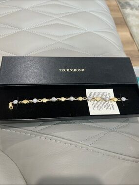 Technibond Two-Tone Gold and Silver Link Bracelet. Size 8
